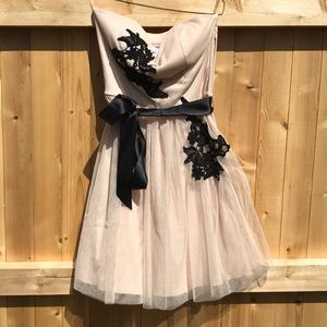 Cream strapless mini dress w black appliqués